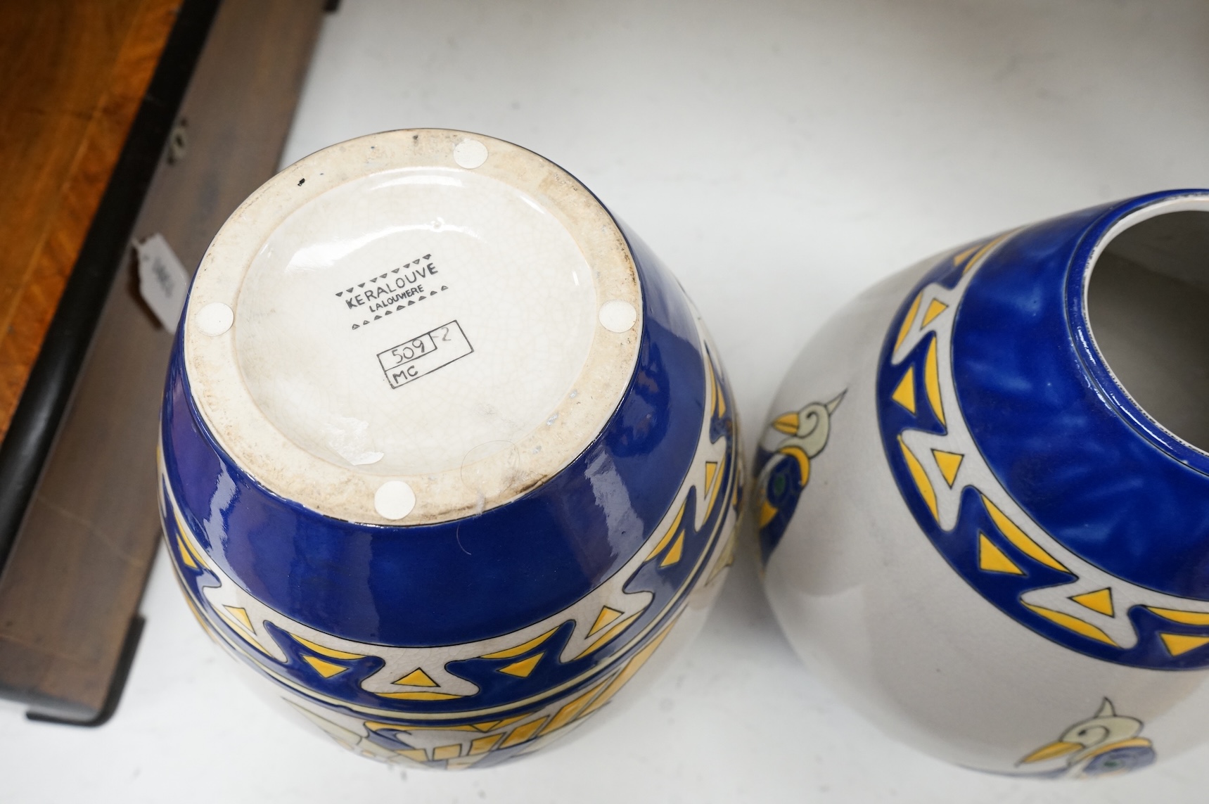 A pair of contemporary Boch Keramis pottery stylised Egyptian bird vases, 31cm high